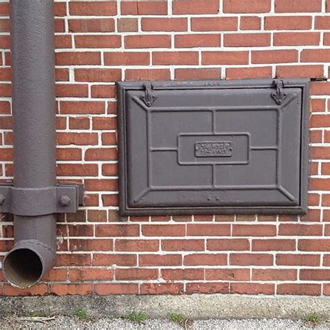 weird little metal flap on side of house|20 Mysterious Old Home Features That Aren’t Useful Anymore.